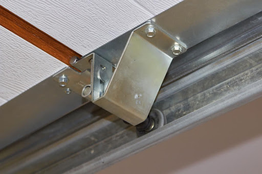 A newly installed garage door roller